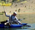 Heenan Lake angler brings fish to net