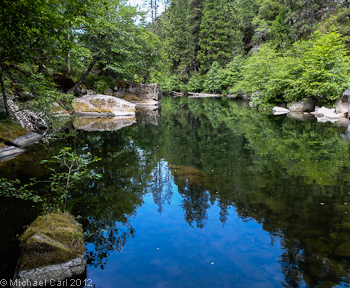 Long, slow pools stretch out upstream from the Sand Bar Flat Diversion Dam.