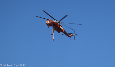An Erickson Air-Crane scouts the Upper Sacramento for a spot to pull water