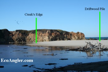 Creek floods behind sandbar on December 17