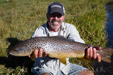 Michael Carl with wild brown trout caught fly fishing.